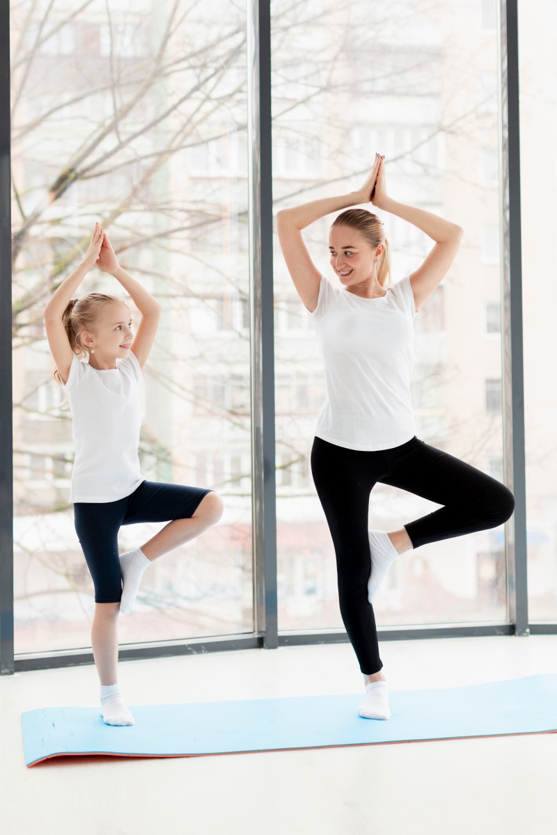 Yoga Pose With Mother Smiley Daughter Home (1)
